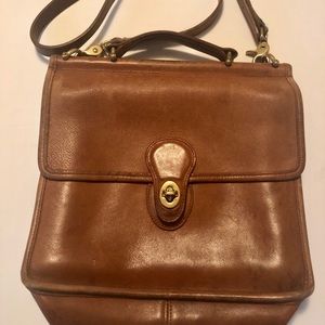 A very loved Vintage coach bag